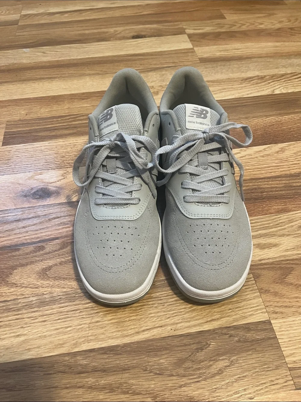 New Balance Men’s Light Gray Suede Sneakers